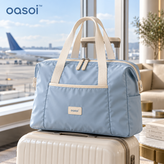 oasoi™ CloudCarry Foldable Weekender Duffel in mist blue and ivory, main lifestyle view